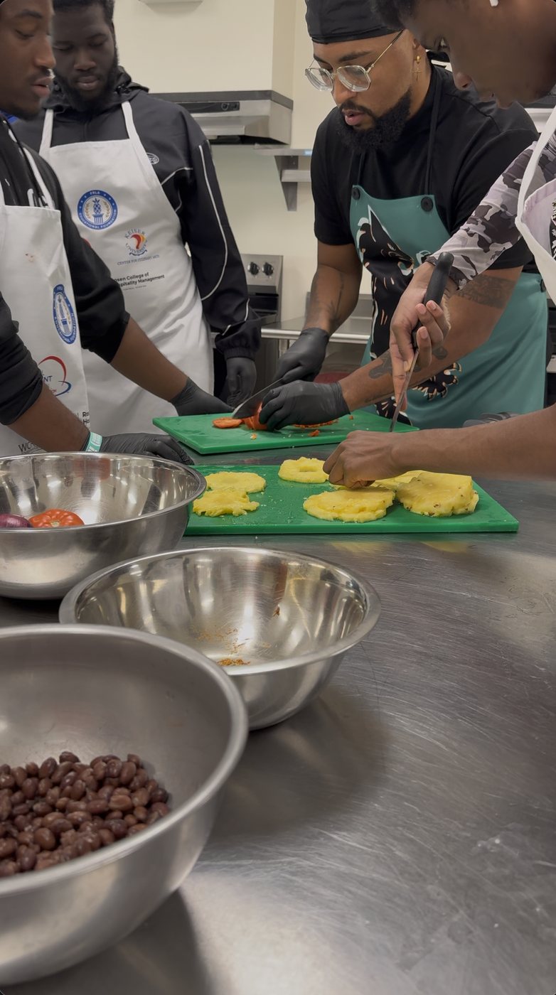 Students cooking at their stations